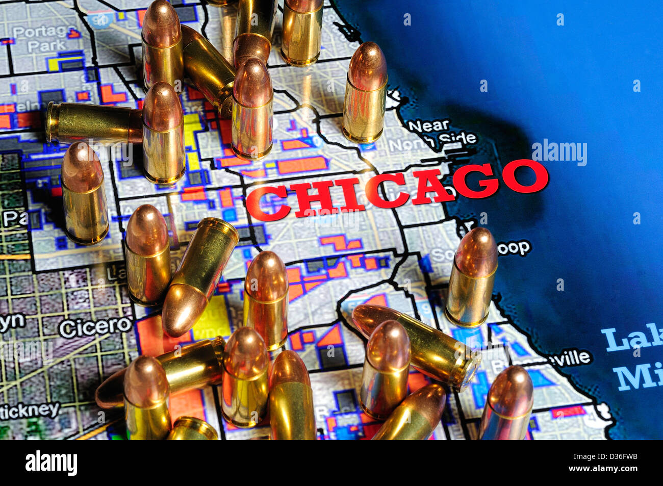 Map of Chicago, Illinois showing rival gang boundaries covered with 9mm bullets. Stock Photo
