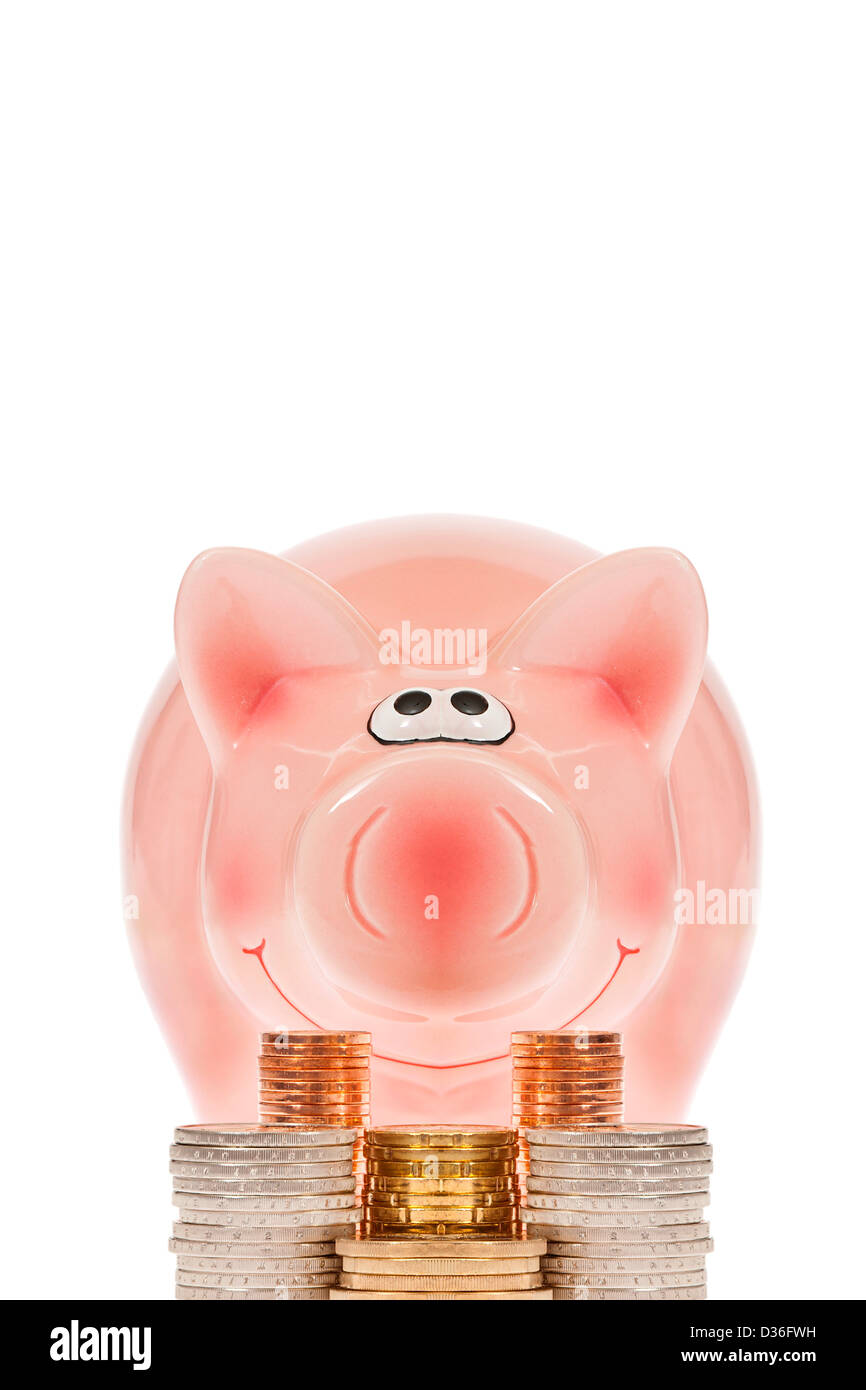 Pink piggy bank with stacks of euro coins against white background ...