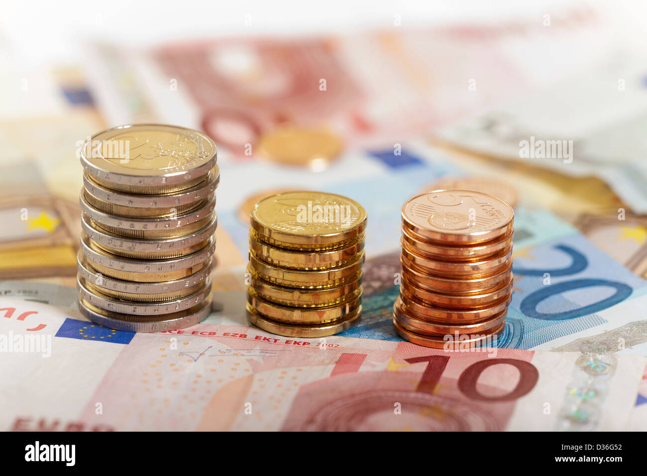 Background of Euro coins and bills Stock Photo - Alamy
