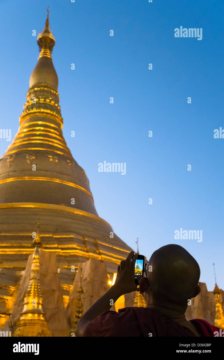 Monk at Shwedagon Pagoda, Yangon, Myanmar, Asia Stock Photo