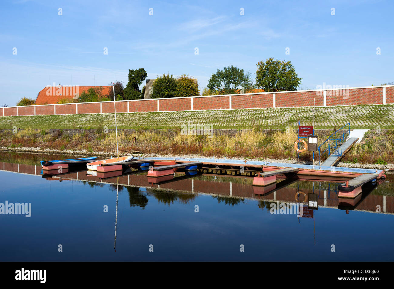 Marina with a flood protection wall in Stiepelse, Amt Neuhaus, Lower Saxony, Germany, Europe Stock Photo
