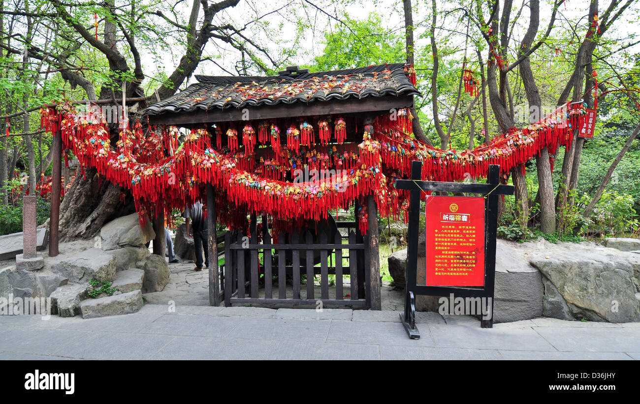 Chinese Good Luck Tokens Vended on Sidewalk, Chengdu, China Stock Photo