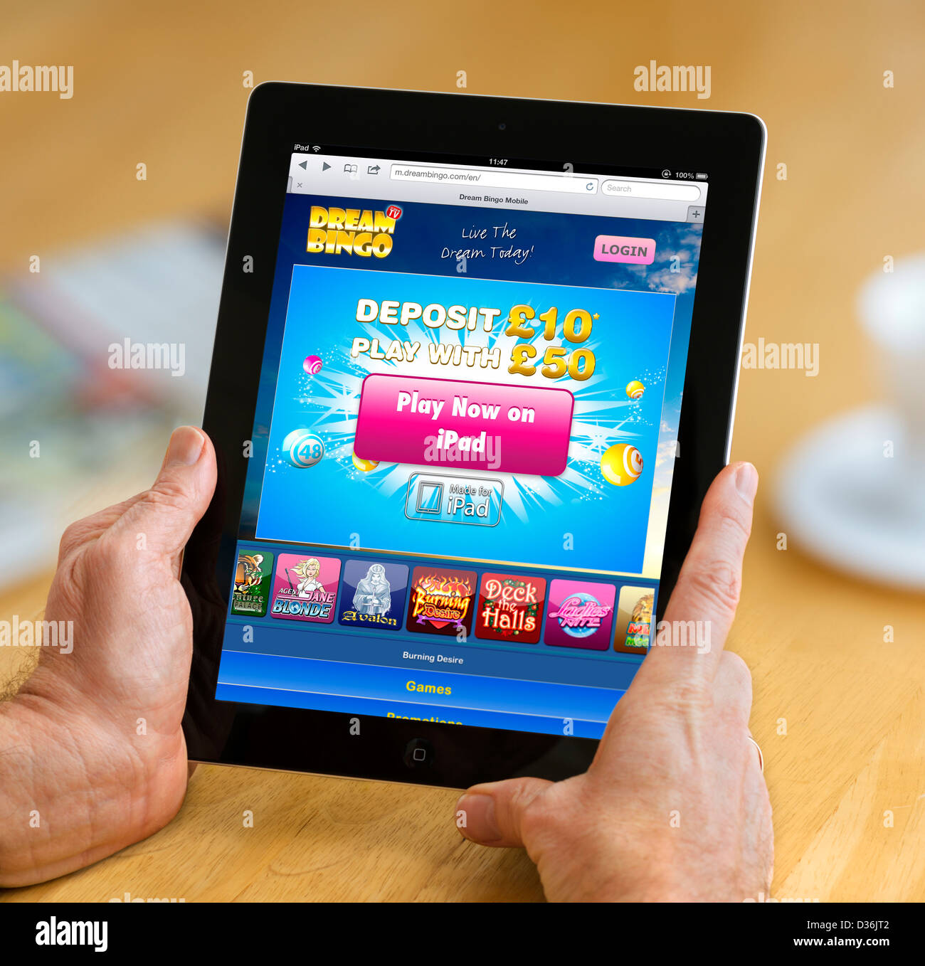 Playing Dream Bingo on a 4th generation Apple iPad, UK Stock Photo