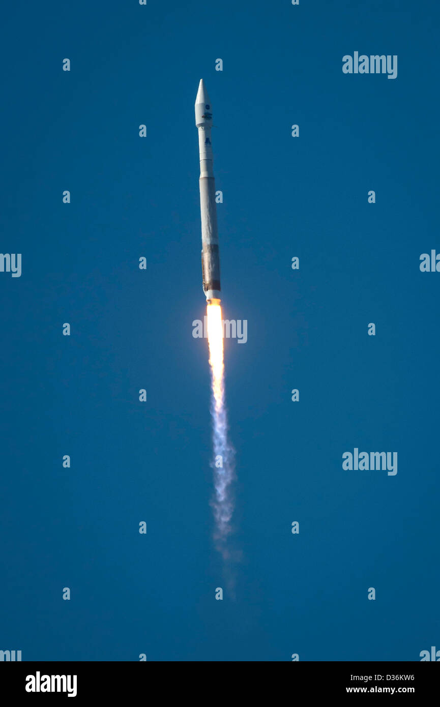 The Landsat Data Continuity Mission spacecraft lifts off atop an Atlas V rocket from Space Launch Complex 3 February 11, 2013 at Vandenberg Air Force Base, California. The satellite is used in agriculture, education, business, science, and government applications. Stock Photo