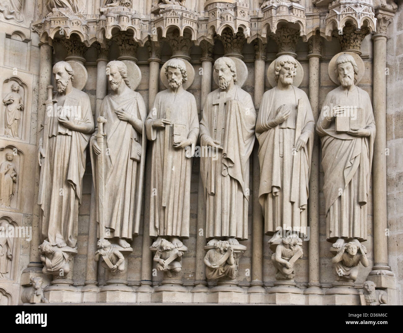 Stone carvings statues on Notre Dame Cathedral Paris France Europe