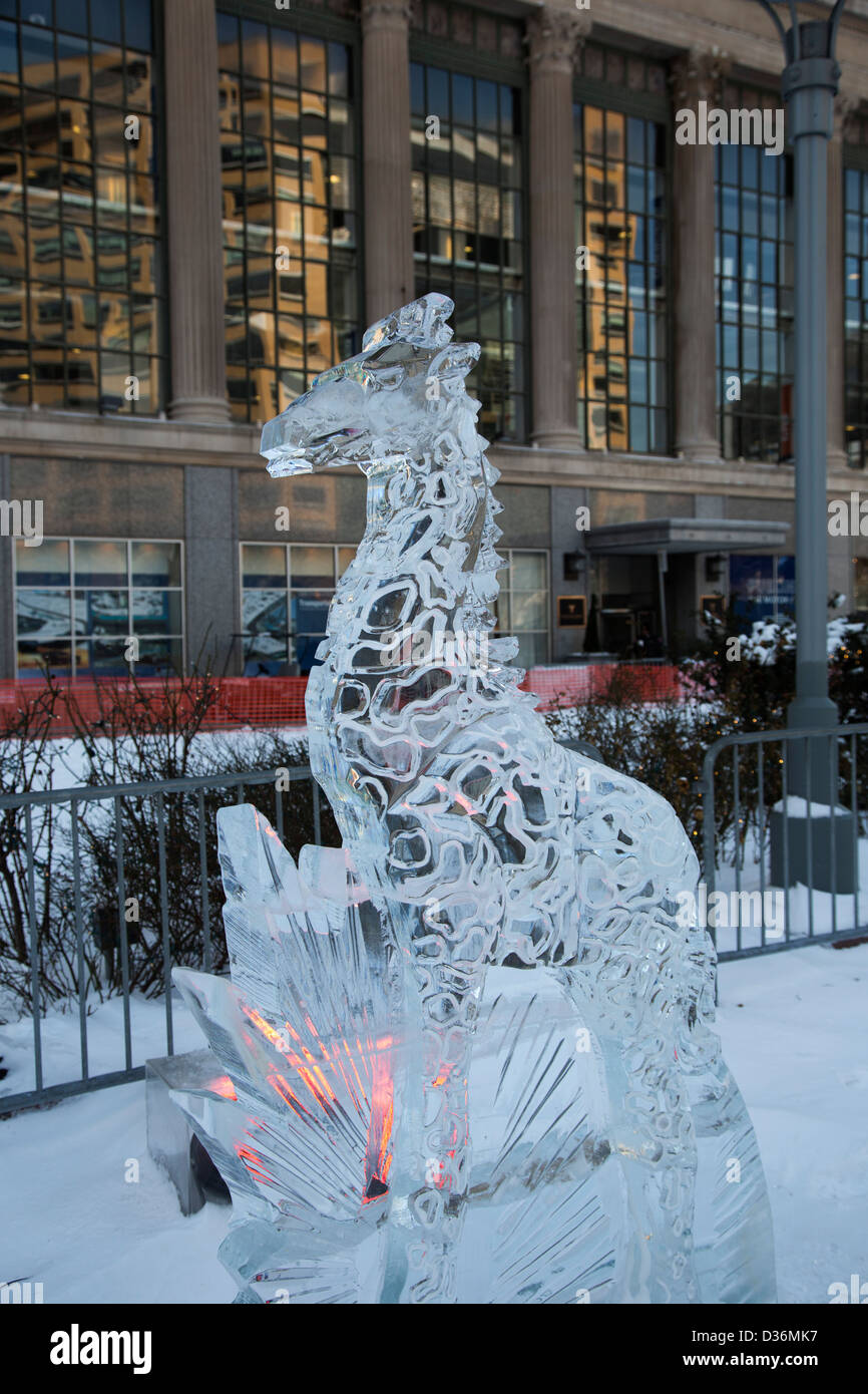 Detroit, Michigan - Ice sculpture of a giraffe at Winter Blast, the city's annual downtown winter festival. Stock Photo