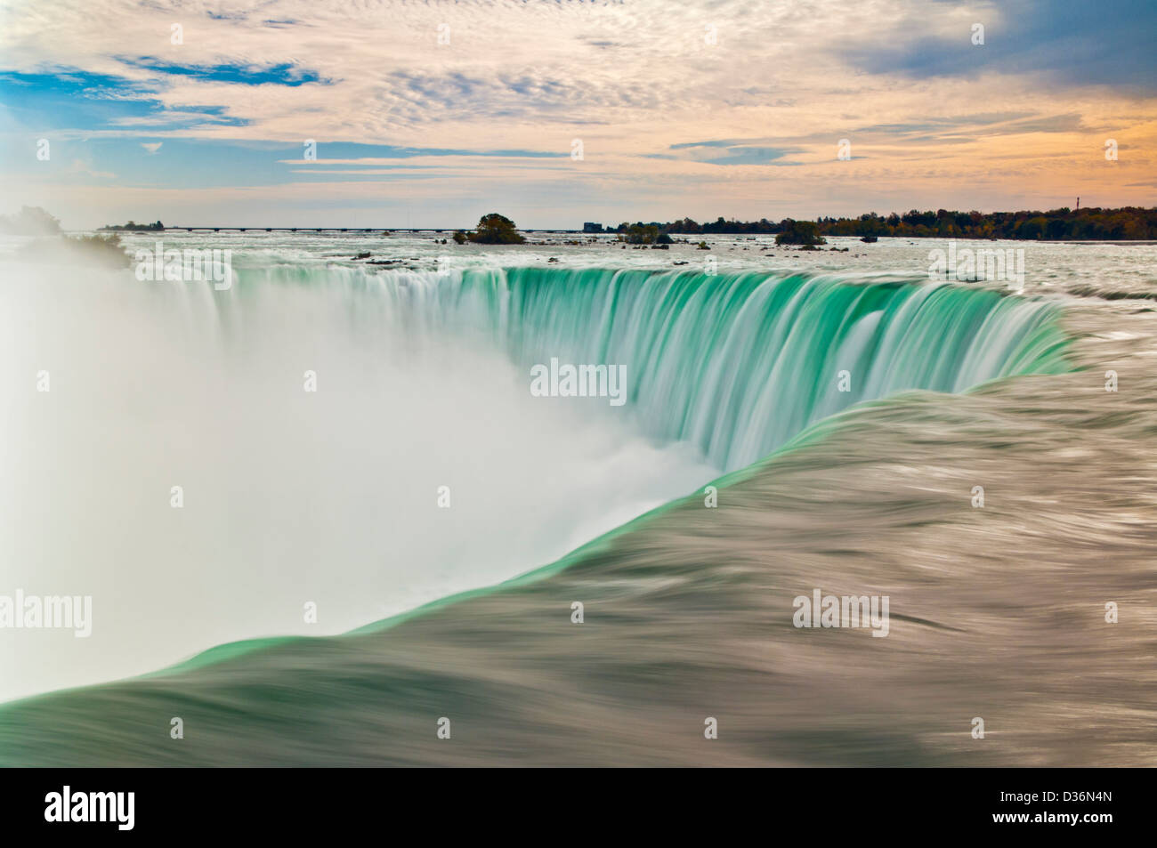 Blurry slow motion water falling over the top of the Horseshoe falls waterfall at Niagara falls Ontario Canada Stock Photo