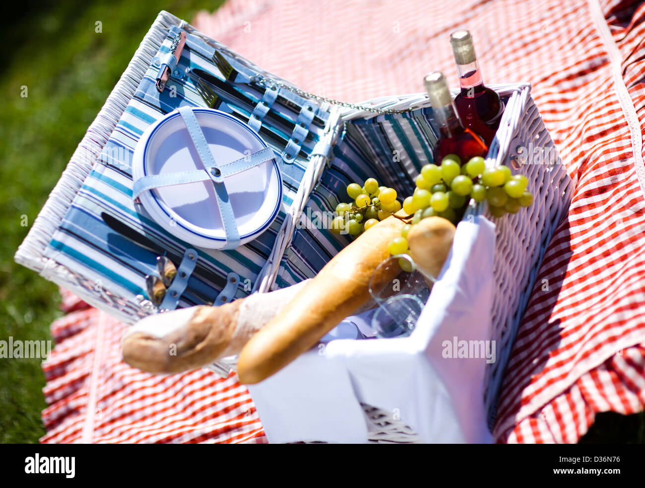 Picnic basket with fruit bread and wine Stock Photo - Alamy