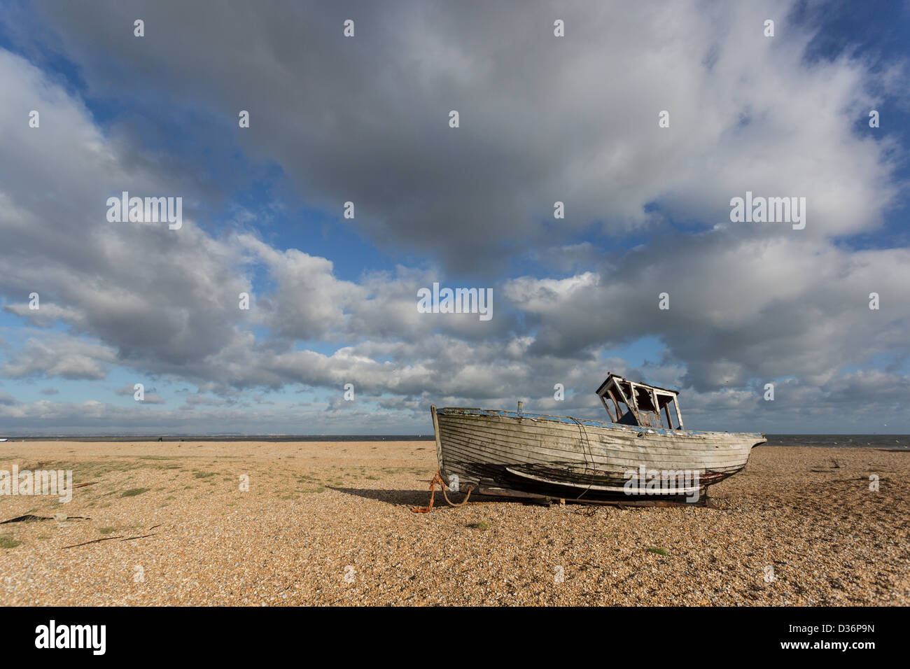 Abandoned fishing boat on the shingle at Dungeness in Kent Stock Photo ...