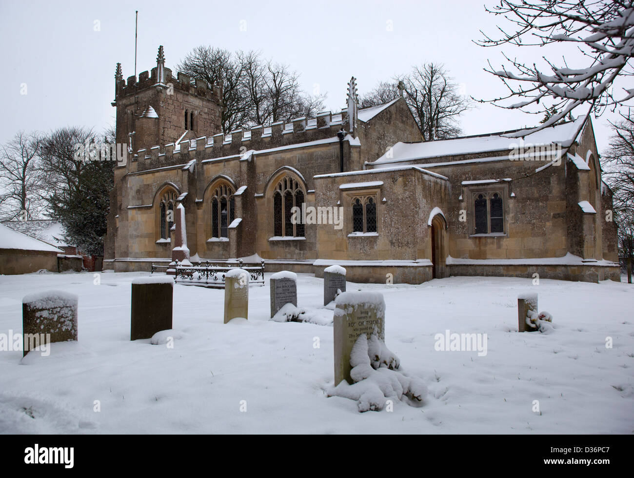 All Saints Church Stanton St Bernard in the snow Stock Photo