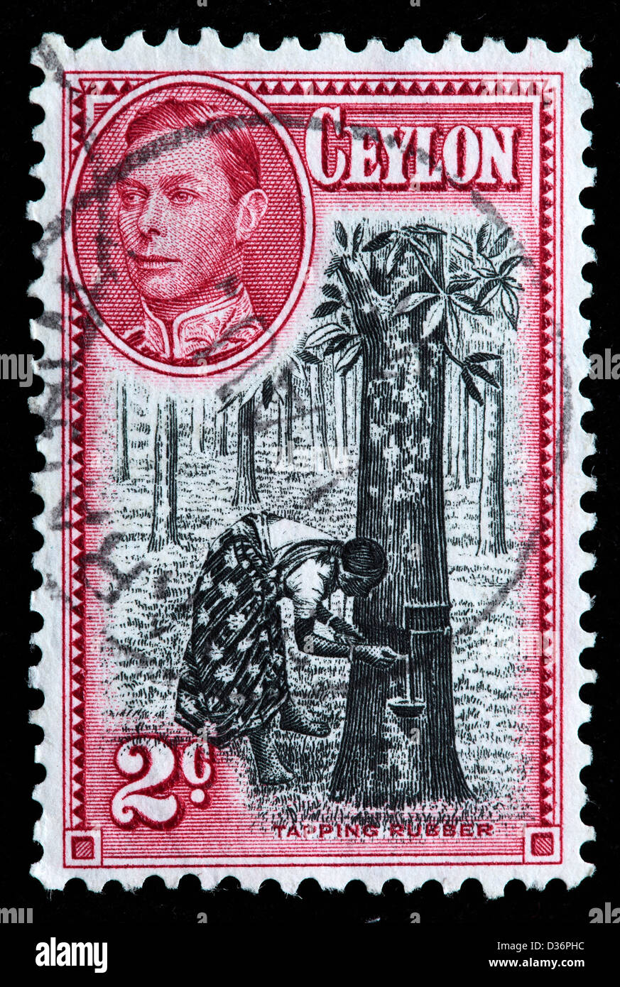 Tapping rubber, postage stamp, Ceylon, 1938 Stock Photo