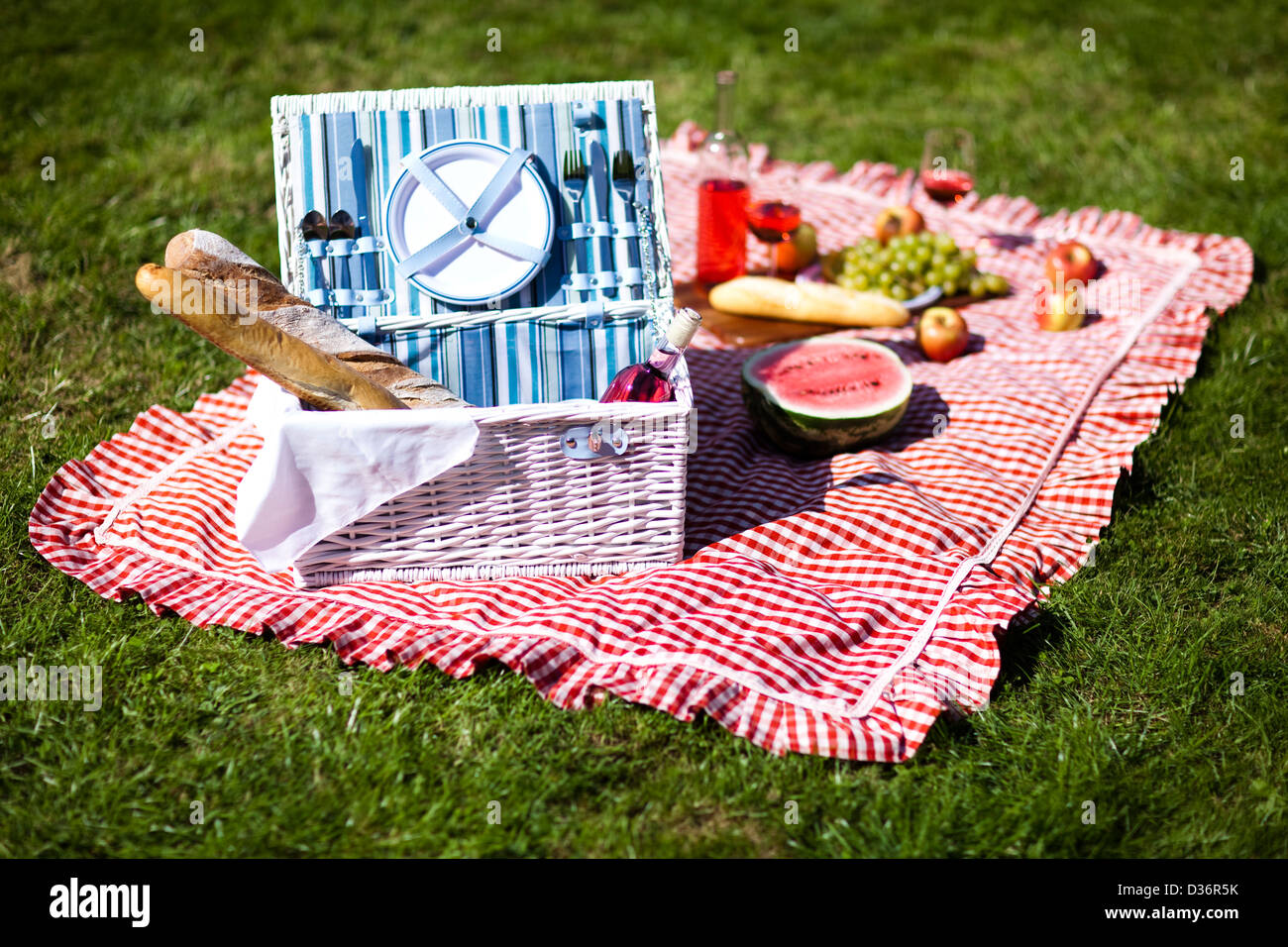 Picnic basket with fruit bread and wine Stock Photo - Alamy