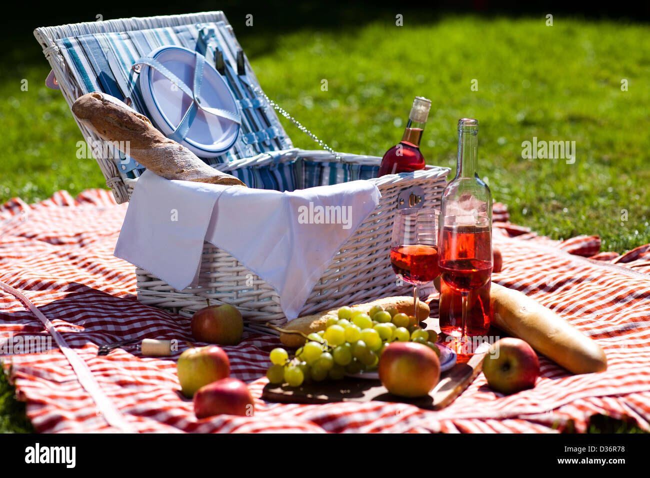 Picnic basket with fruit bread and wine Stock Photo - Alamy