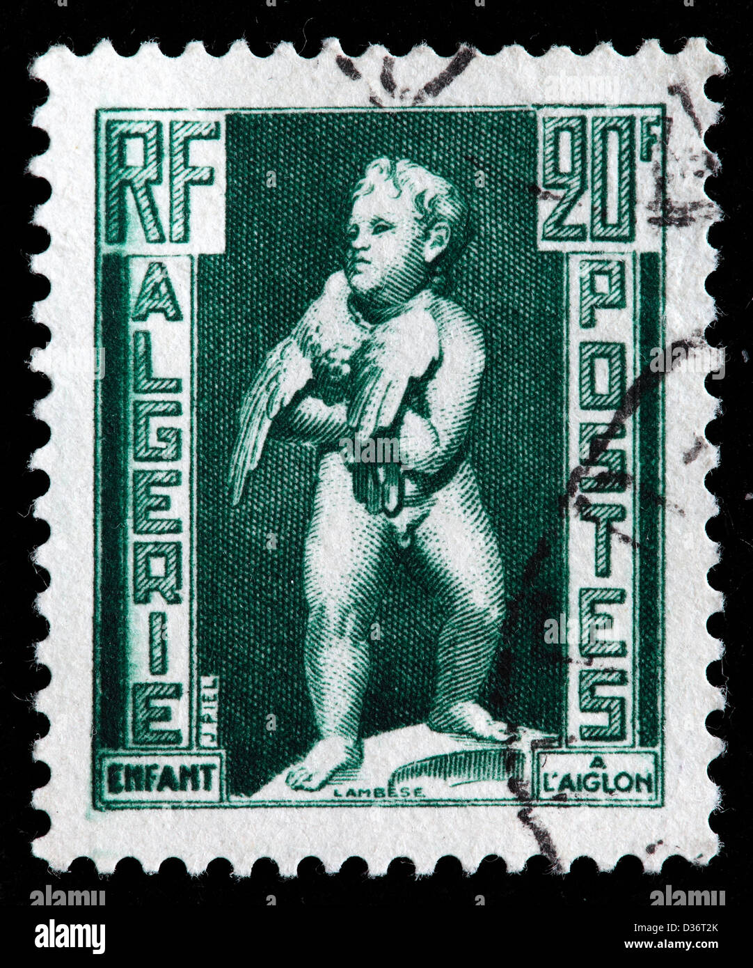 Child with eagle, postage stamp, Algeria, 1952 Stock Photo