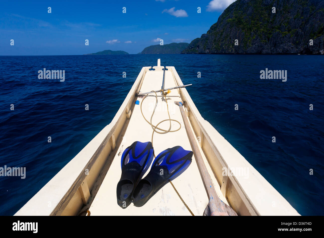 Go to deep sea - flipper on the boat Stock Photo