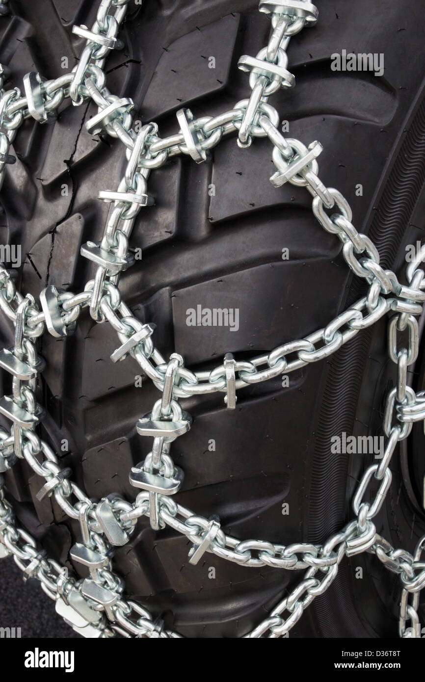 tire with snow chains Stock Photo