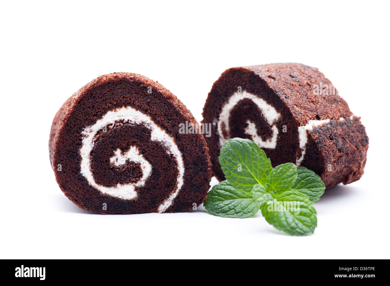 Chocolate cake with green mint leaves Stock Photo Alamy