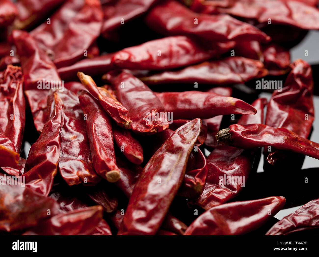 Dried red chili peppers. Studio shot. Hot and spicy Stock Photo - Alamy