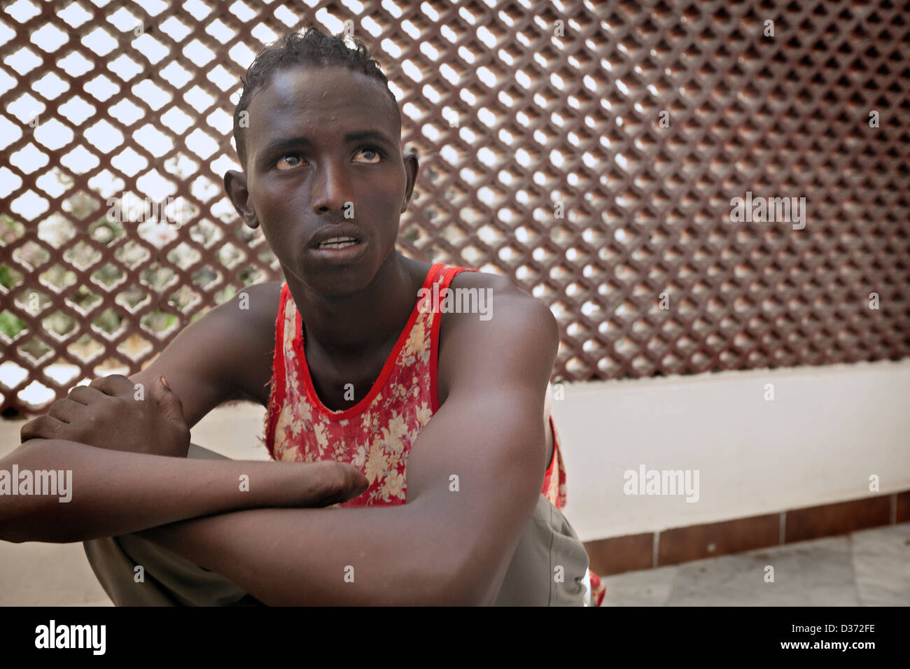A teenager who had his hand amputated by Al-Shabaab in the turmoil of civil war in Mogadishu, Somalia Stock Photo