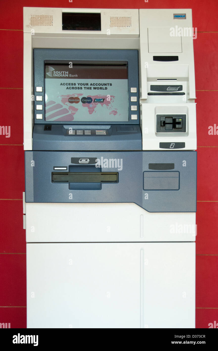 ATM machine in red background Stock Photo