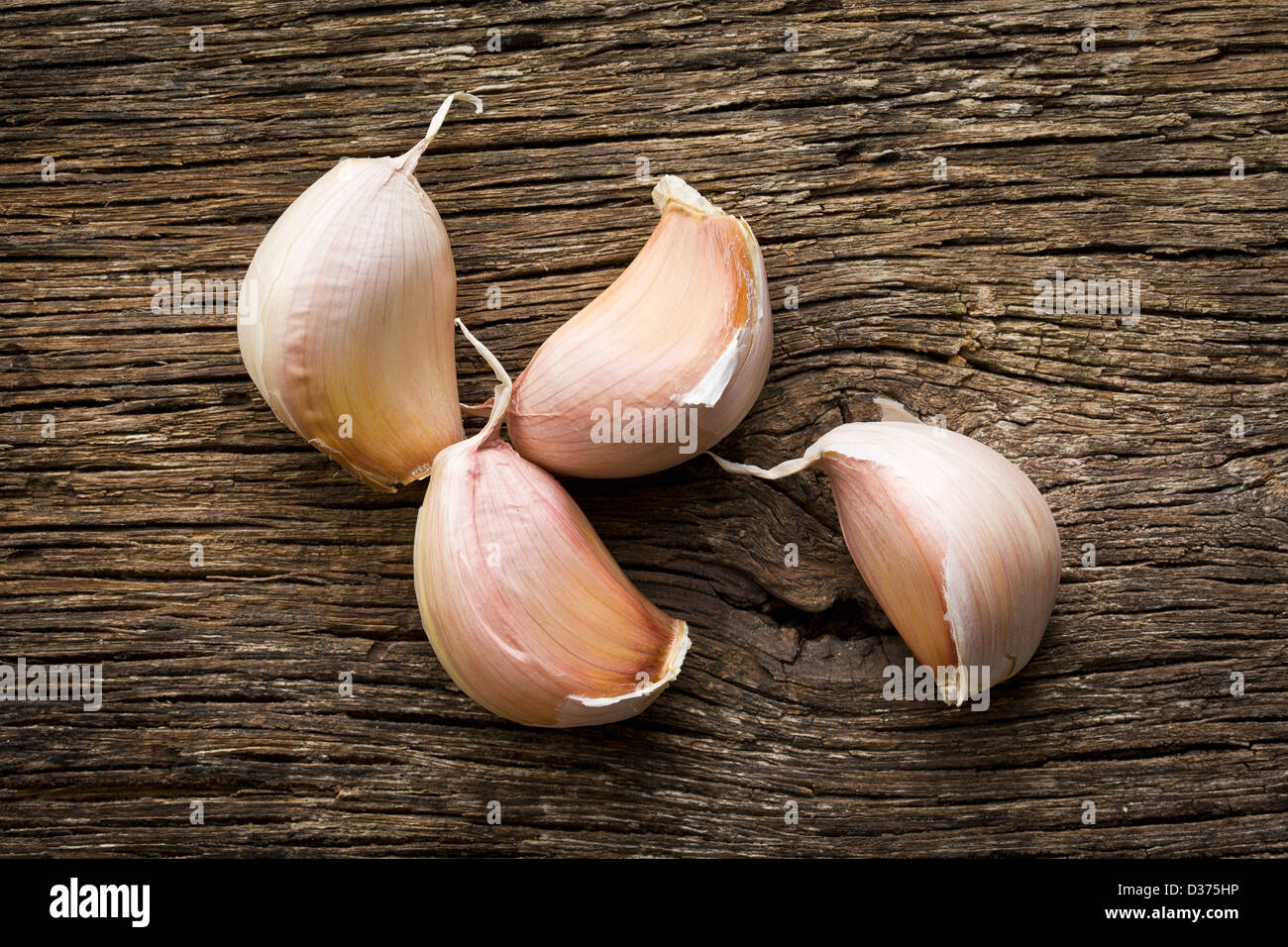 the fresh garlic on wooden table Stock Photo