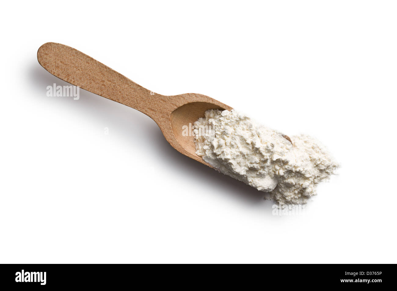 flour in wooden scoop on white background Stock Photo