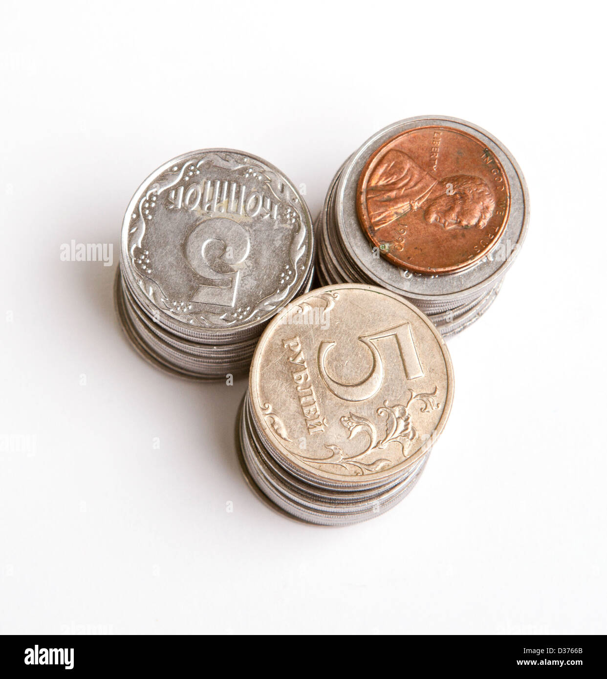 stack of coins isolated on a white background Stock Photo - Alamy