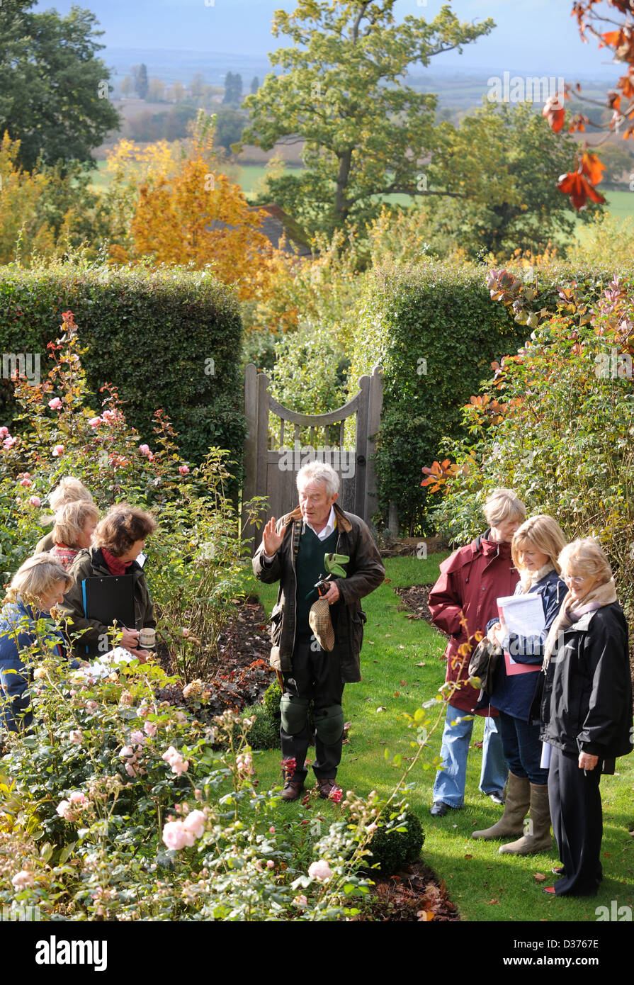 The gardener Roddy Llewellyn with a ladies gardening group near Shipston-on-Stour where he runs garden demonstrations and course Stock Photo