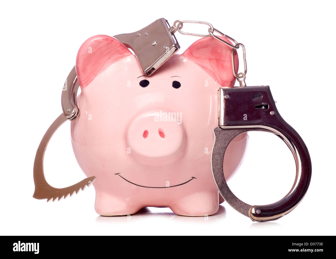 piggy bank with handcuffs studio cutout Stock Photo