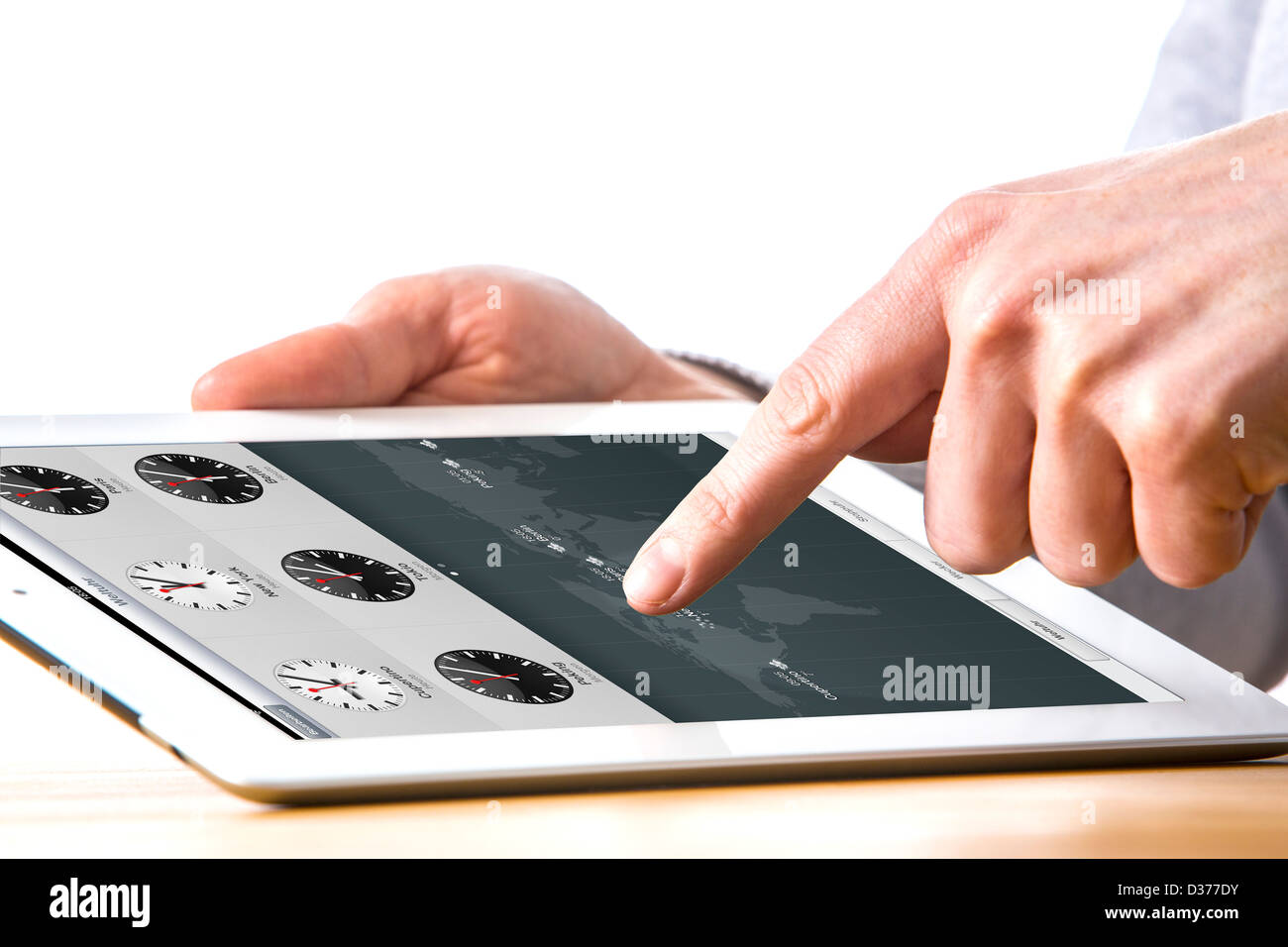 Person is using a tablet computer. Time, clock, watch, alarm clock