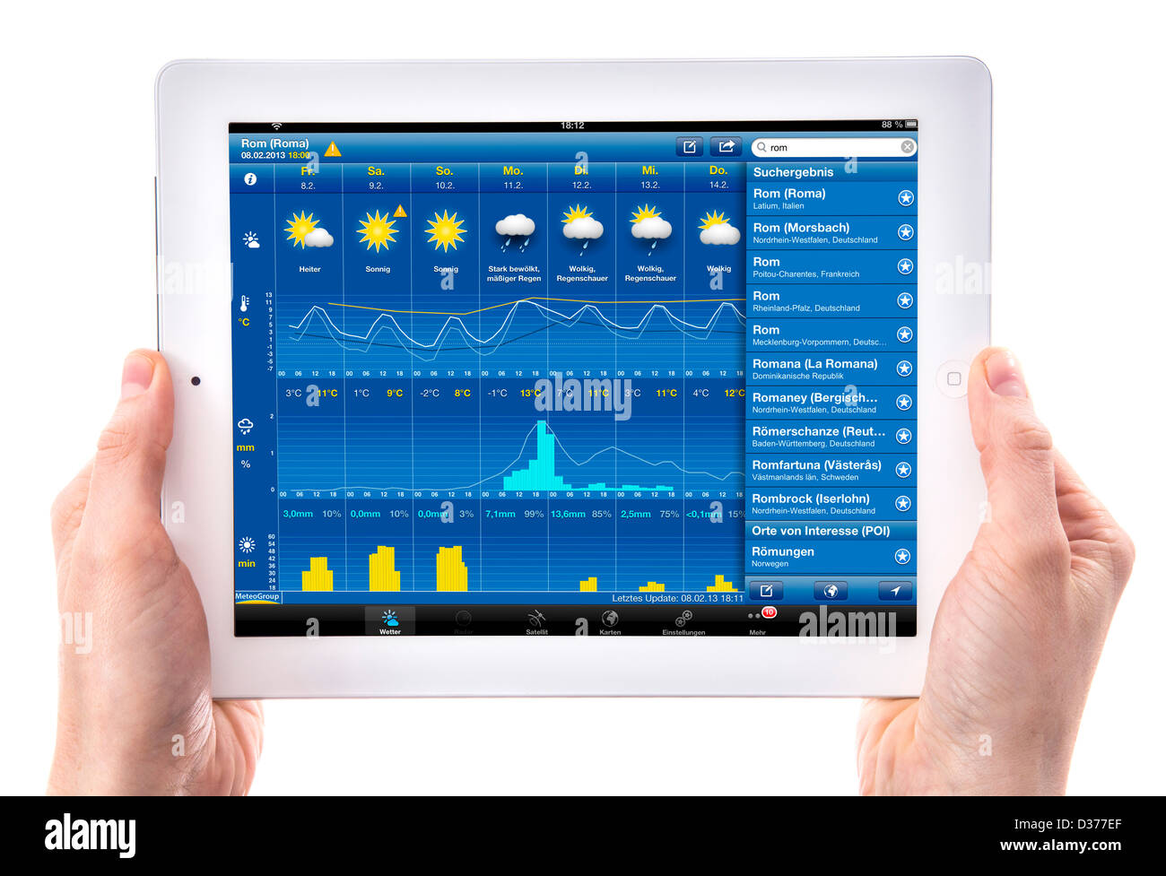 Person is using a tablet computer. Weather forecast site. Stock Photo