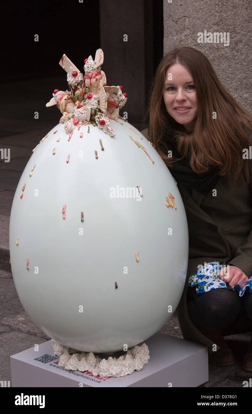 London, UK. 12th February 2013.  Pictured: artist Anna Barlow with her creation 'Anticipation of a 1000 Moments'. Over 100 giant Easter eggs designed by artists and designers were unveiled today in Covent Garden Piazza, London, to launch The Lindt Big Egg Hunt in support for the charity 'Action for Children'. For six weeks, from 12 February to 1 April 2013, giant Easter eggs will tour the country, from London's Covent Garden to Birmingham, Liverpool, Manchester, Glasgow and back to London in time for Easter. Photo: Nick Savage/Alamy Live News Stock Photo