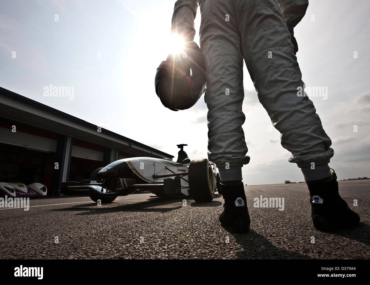 James Martin standing with Formula one Jaguar racing car, Bedford autodrome, UK 12 04 10 Stock Photo