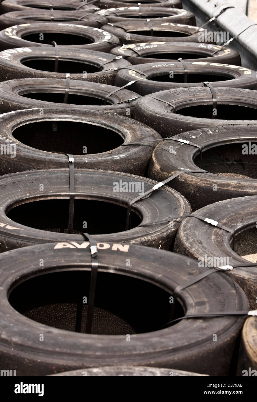 Car tyres making crash barrier at Bedford autodrome, UK Stock Photo