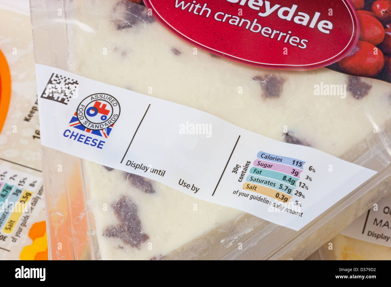 Close up of a sell by/useby/displayby label on a packet of cheese