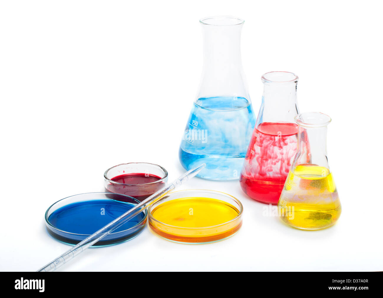 Laboratory equipment and color chemicals on white background Stock ...