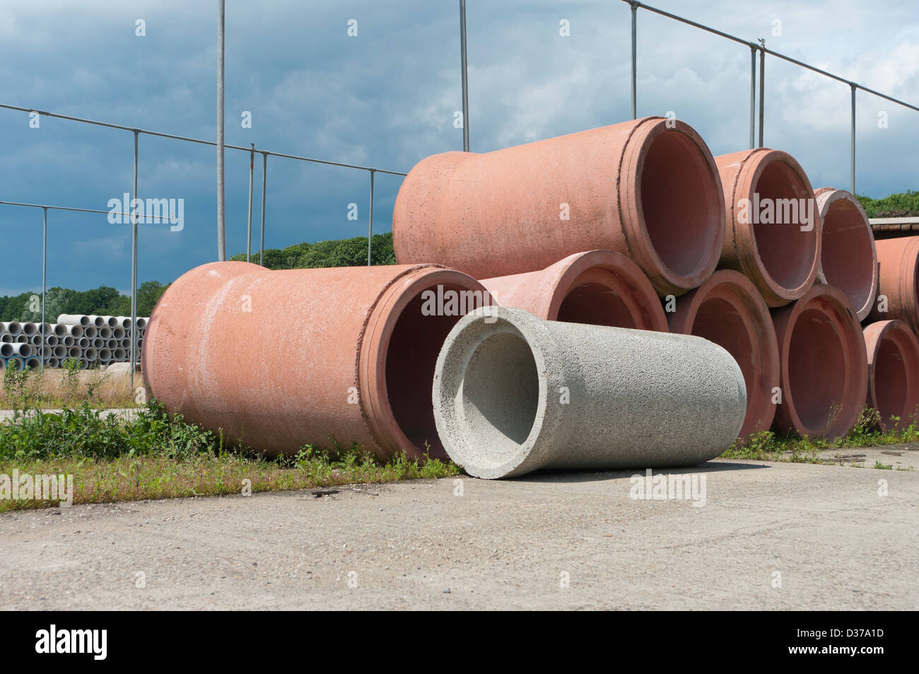 piled up concrete drain pipes Stock Photo Alamy