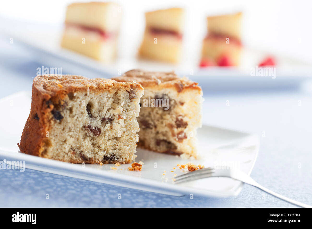 Wedge slice of fruitcake made with raisins Stock Photo