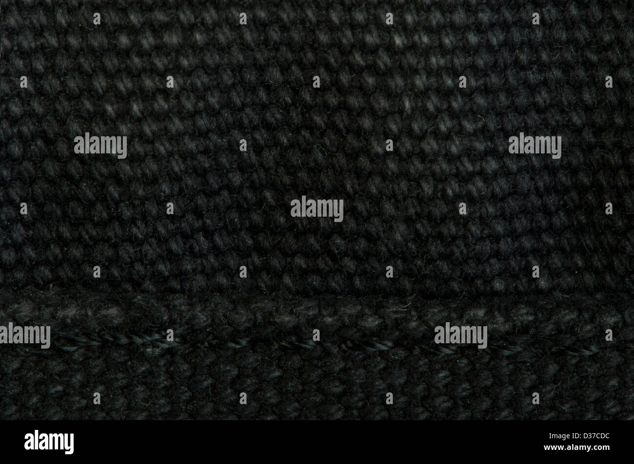 Black textile background. Close up surface. Studio shot Stock Photo