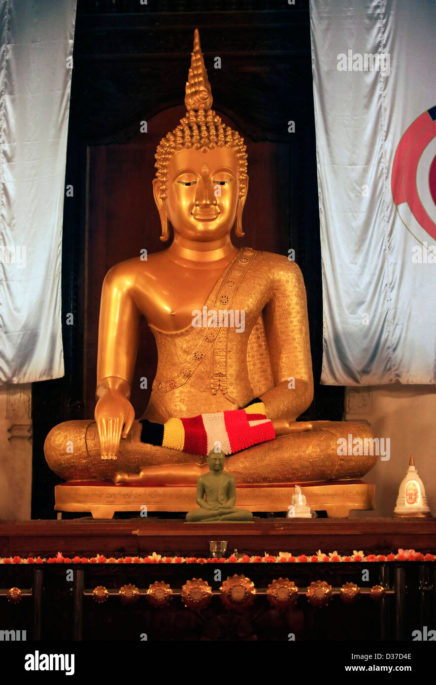 Statue Buddha in very important Buddhist shrine Temple of the Tooth