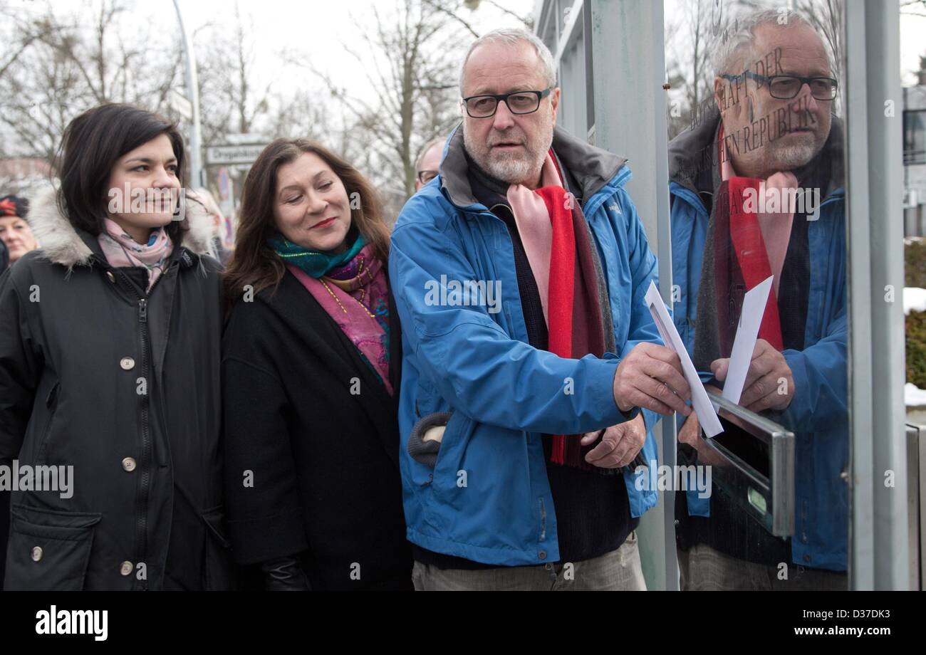 Actresses Jasmin Tabatabai (L-R) and Eva Mattes and director Pepe Danquart insert a petition in the postbox of the Iranian embassy to claim the release of Iranian director Jafar Panahi, beside the 63rd annual Berlin International Film Festival aka Berlinale, in Berlin, Germany, 12 February 2013. Panahi, who's movie 'Parde' ('Closed Curtain') was presented in the official Berlinale competition on Tuesday, 12 Fruary 2013 has been banned from filmmaking for the next 20 years on charges of working against Iran's ruling system. Photo: Joerg Carstensen/dpa Stock Photo