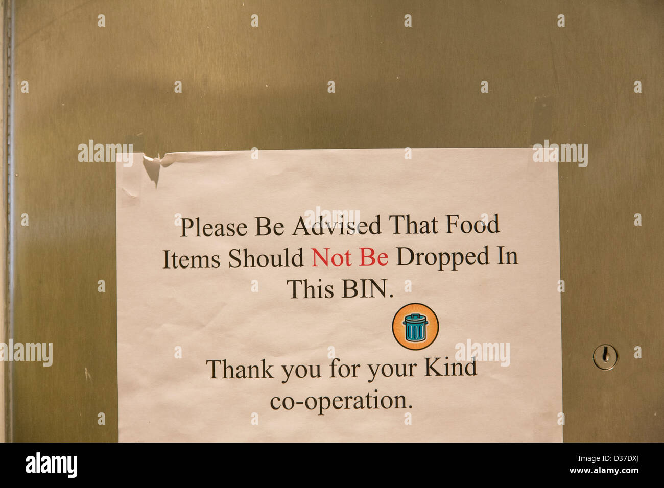 Notice above a rubbish bin Stock Photo Alamy