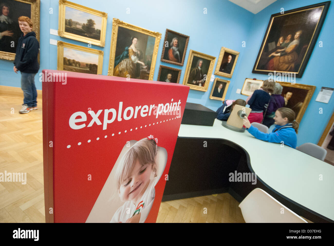 Young children interacting at The Beaney Museum of Canterbury in Kent UK Stock Photo