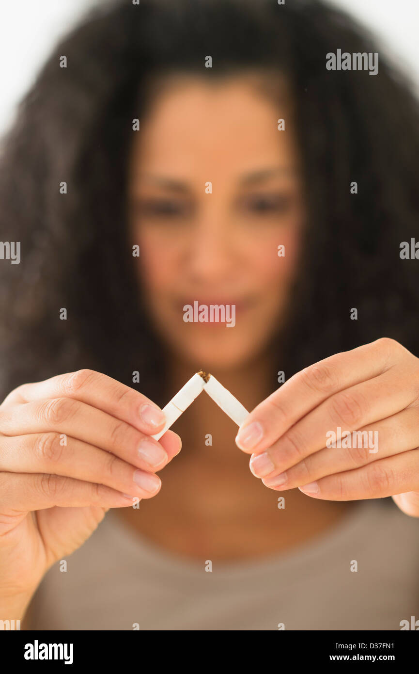 Woman smoking cigarette indoors hires stock photography and images Alamy