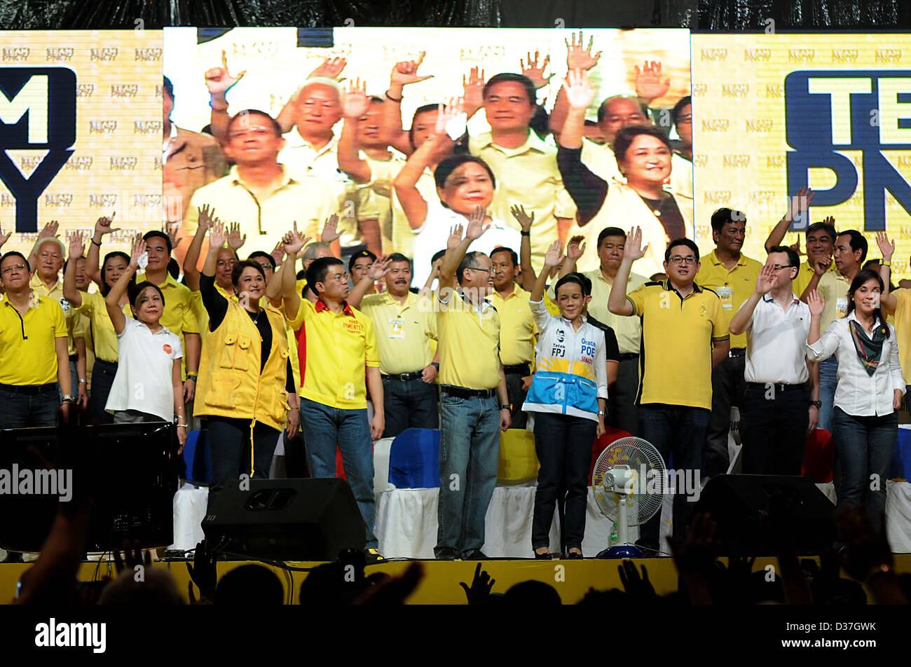 Manila, Philippines. 12th February 2013. Administration senatorial candidates together with Philippine President BENIGNO AQUINO III wave their hands during a proclamation rally for their slate in the May congressional and local election in Manila, 12 February 2013. Senatorial candidates for the May 13 midterm elections kicked off their campaigns as the official start of the campaign period for national positions started. The campaign season is slated from February 12 to May 11, 2013. � Credit: Ezra Acayan / Alamy Live News Stock Photo