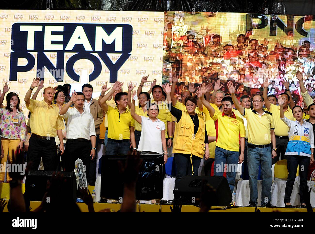 Manila, Philippines. 12th February 2013. Administration senatorial candidates together with Philippine President BENIGNO AQUINO III wave their hands during a proclamation rally for their slate in the May congressional and local election in Manila, 12 February 2013. Senatorial candidates for the May 13 midterm elections kicked off their campaigns as the official start of the campaign period for national positions started. The campaign season is slated from February 12 to May 11, 2013. � Credit: Ezra Acayan / Alamy Live News Stock Photo