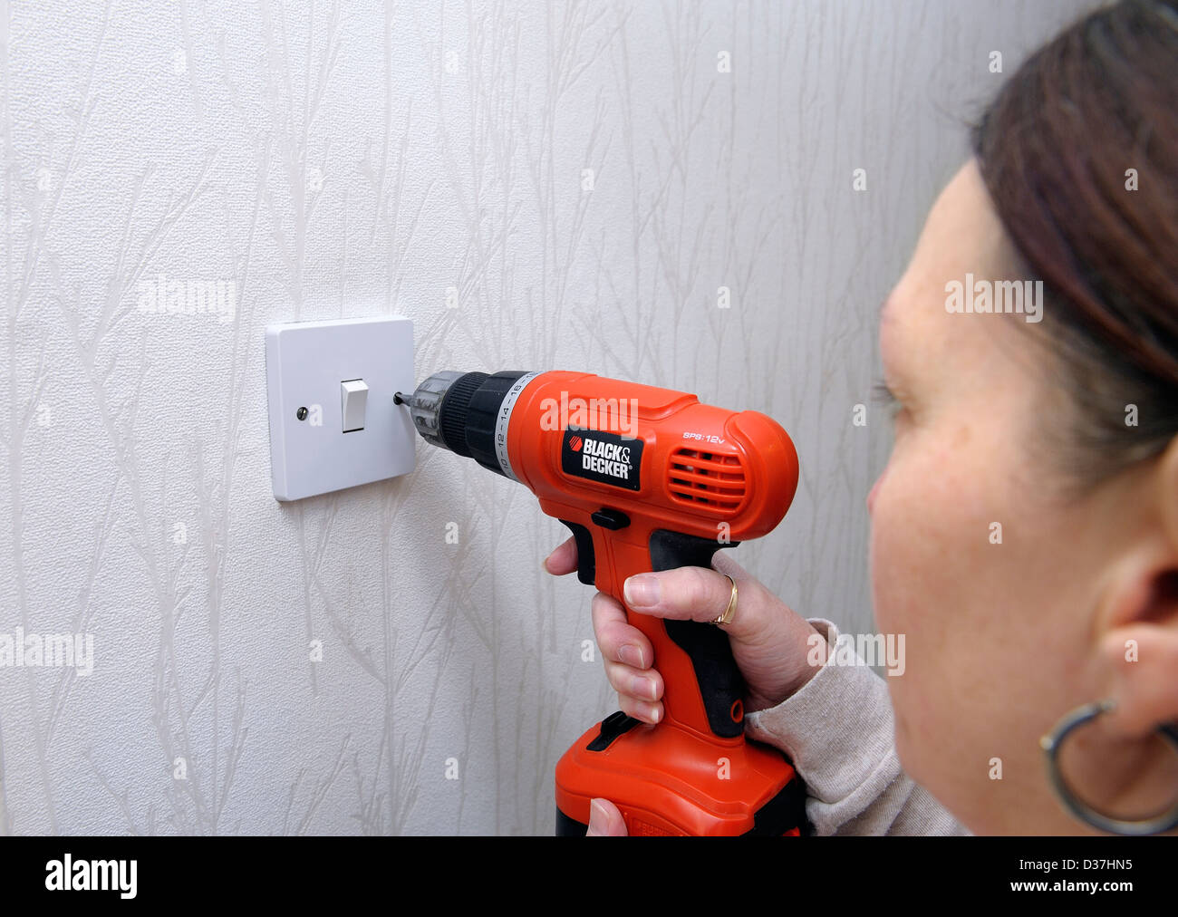 female using a rechargeable screwdriver Stock Photo Alamy
