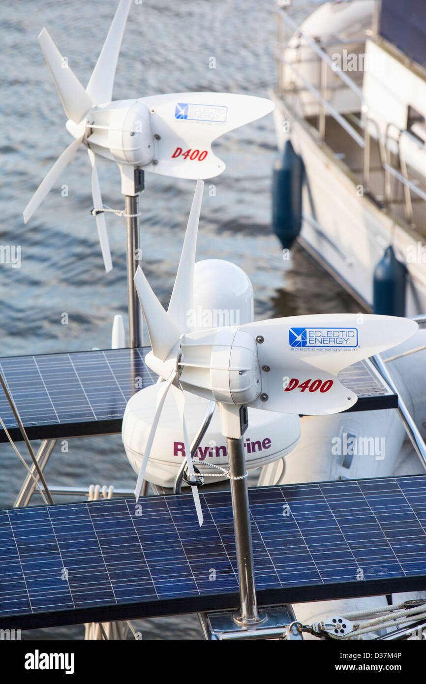 Solar panels and wind turbines to provide power on a yacht Stock Photo Alamy