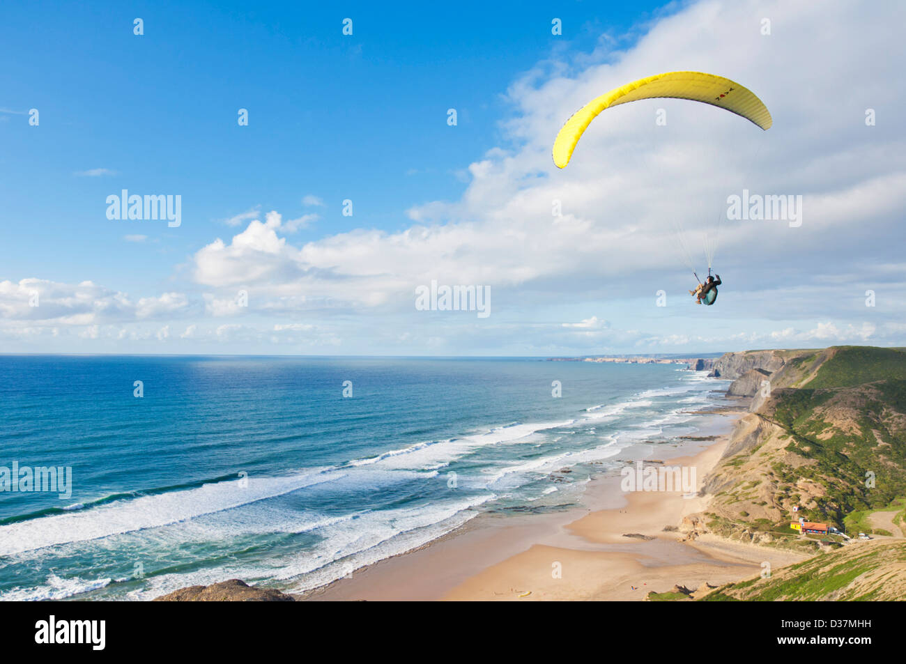 Paraglider above Castelejo and Cordama beaches Costa Vincentina South