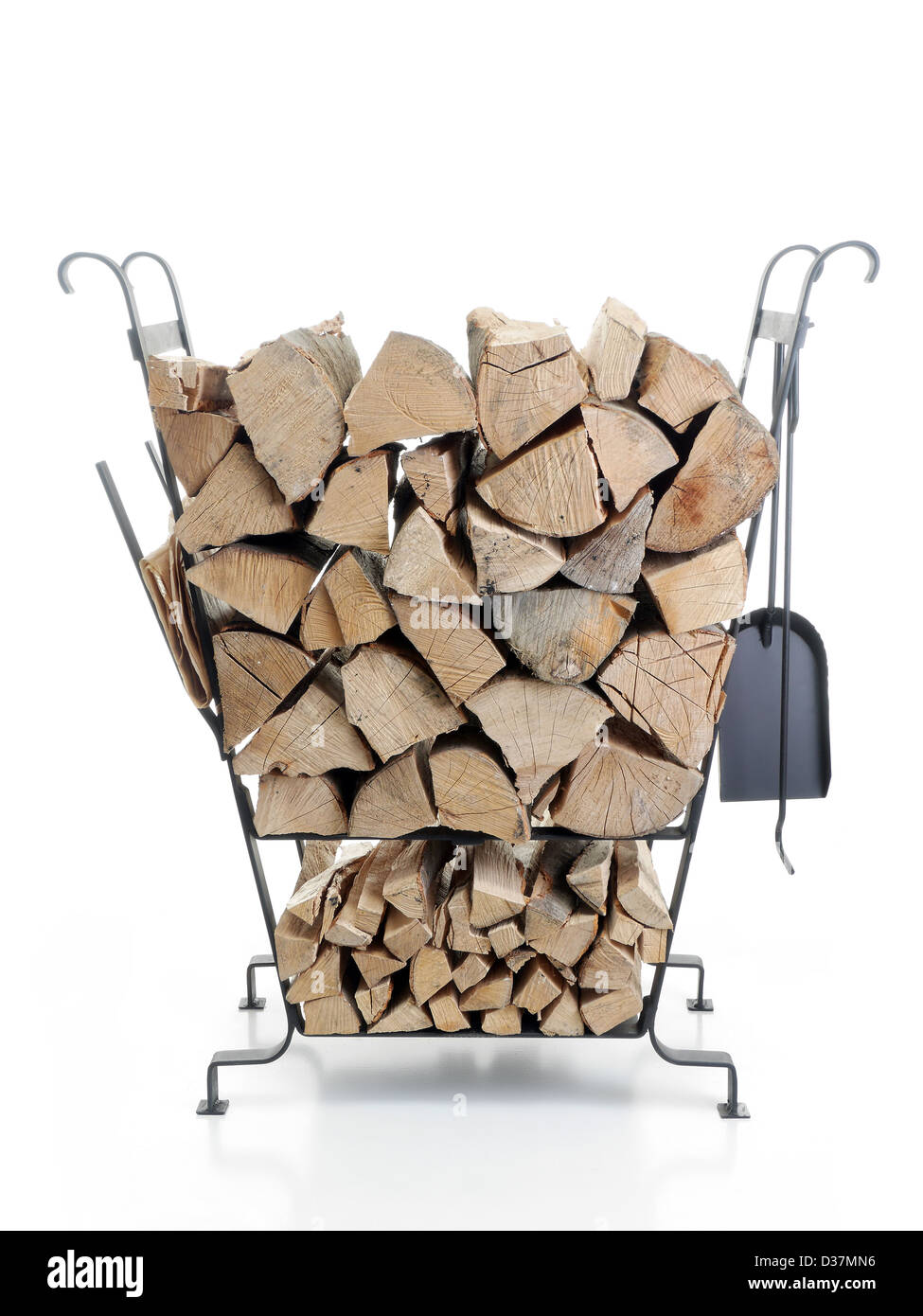 Black firewood metal stand loaded with chopped beechwood logs shot on white background Stock Photo